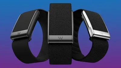 A Whoop activity band showing the fabric wrist strap.