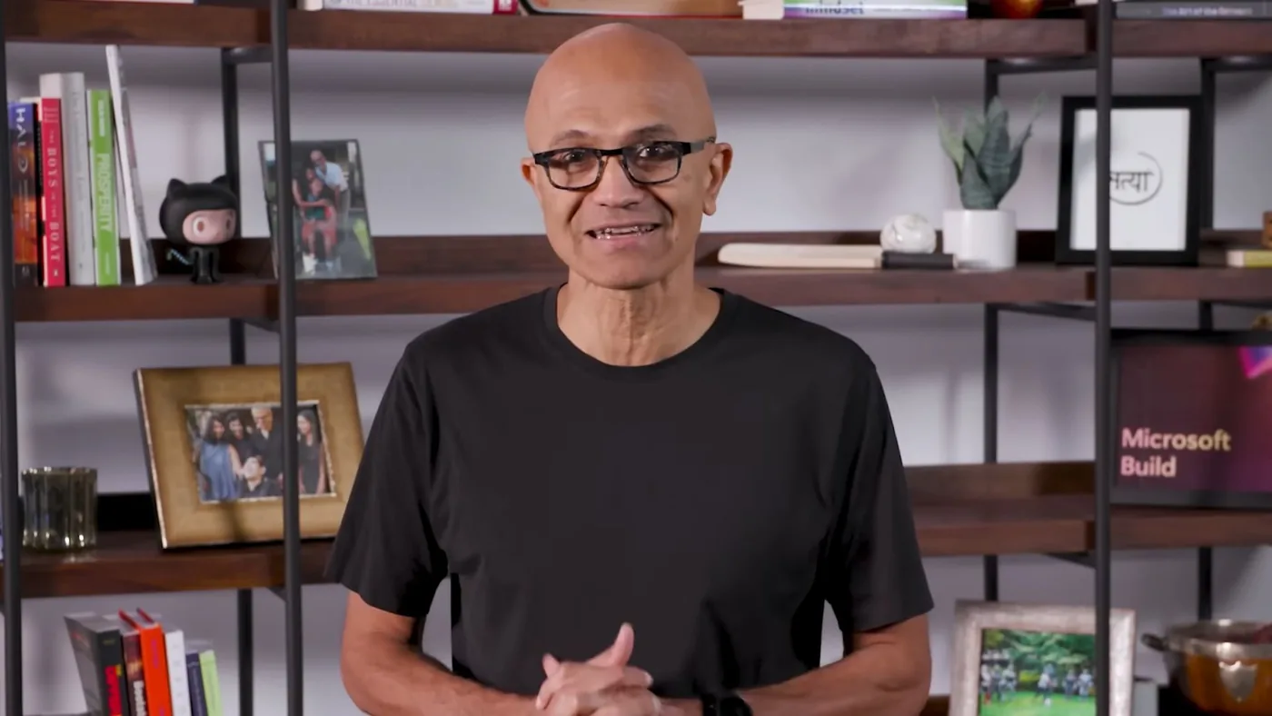 Satya Nadella evaluating Microsoft CEO Xbox operations and division strategy during corporate transitions.