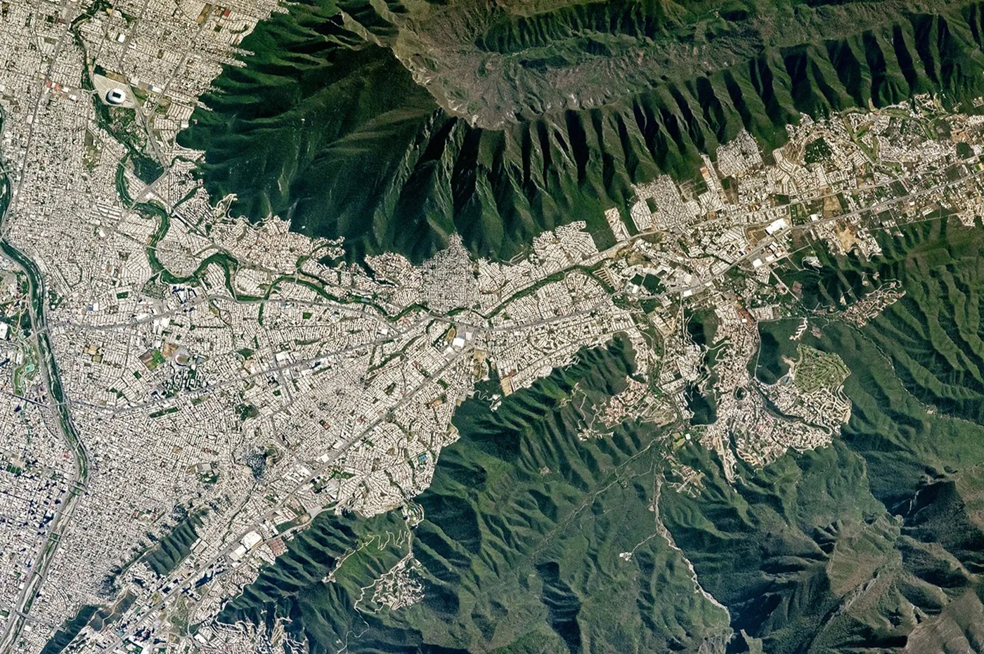 Astronaut view of southeastern Monterrey and the ridges of Cerro de la Silla.