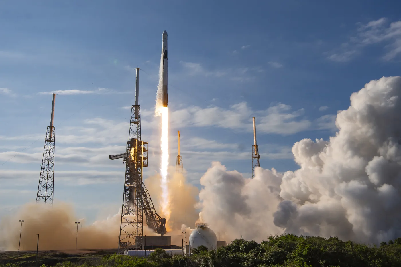 SpaceX Dragon cargo spacecraft prepares for orbital delivery following missions planned when NASA awarded SpaceX flights.