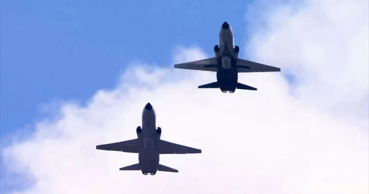 Two NASA T-38 Talon supersonic training jets fly over Acrisure Stadium during the NASA Inspiration Tour.