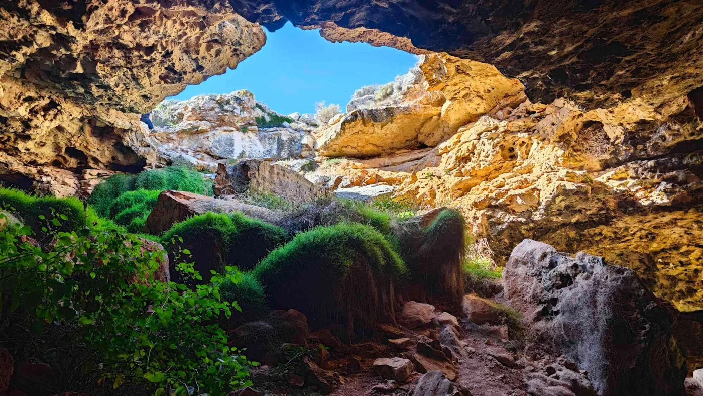 Limestone entrance of Nullarbor caves exposed on the Australian plain
