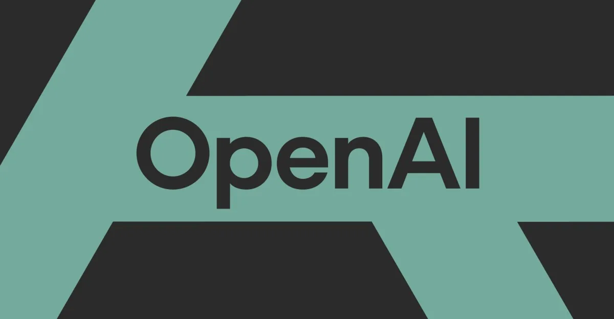 OpenAI logo artwork featured by The Verge as OpenAI pauses training on frontier models.