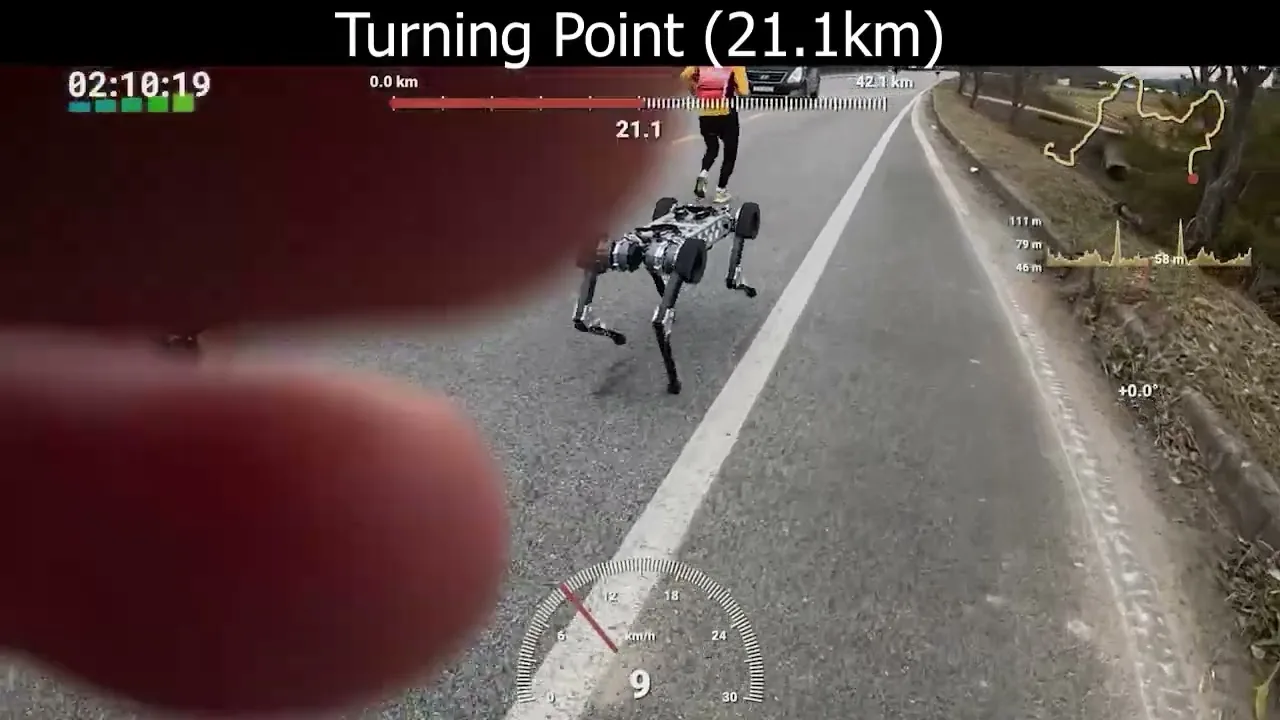 RAIBO2 running on the outdoor asphalt course during the robot dog marathon event