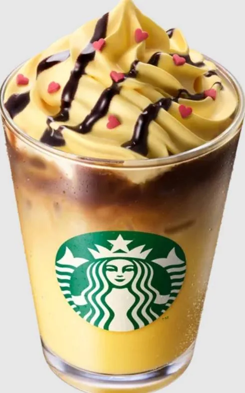 Cream-colored espresso topped with honey cream and heart-shaped sugar for the Starbucks Pikachu latte collaboration.