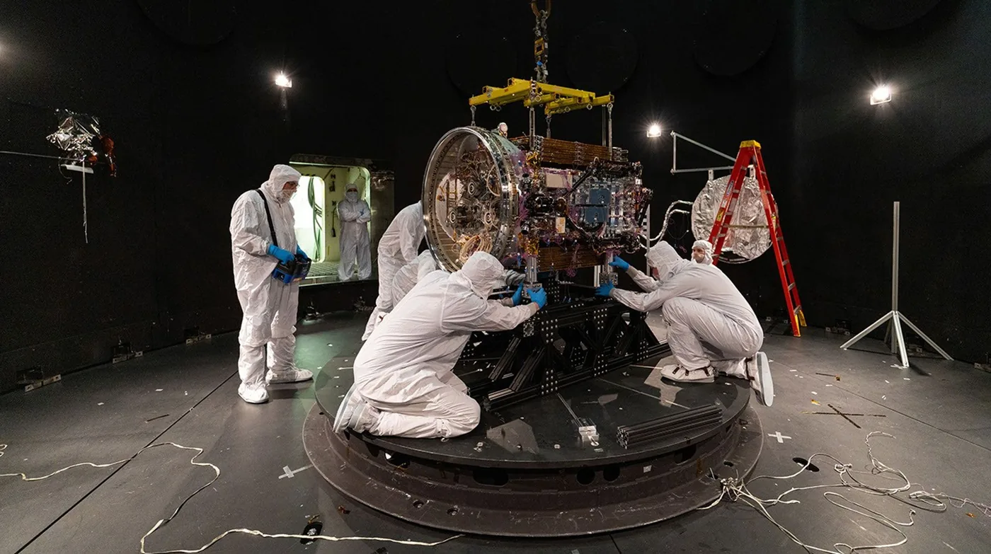 Engineers working on LINK inside the Space Environment Simulator at NASA Goddard