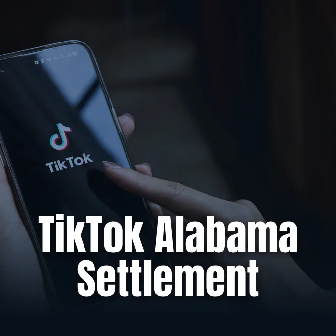 A smartphone displaying the TikTok app icon related to the TikTok Alabama settlement.