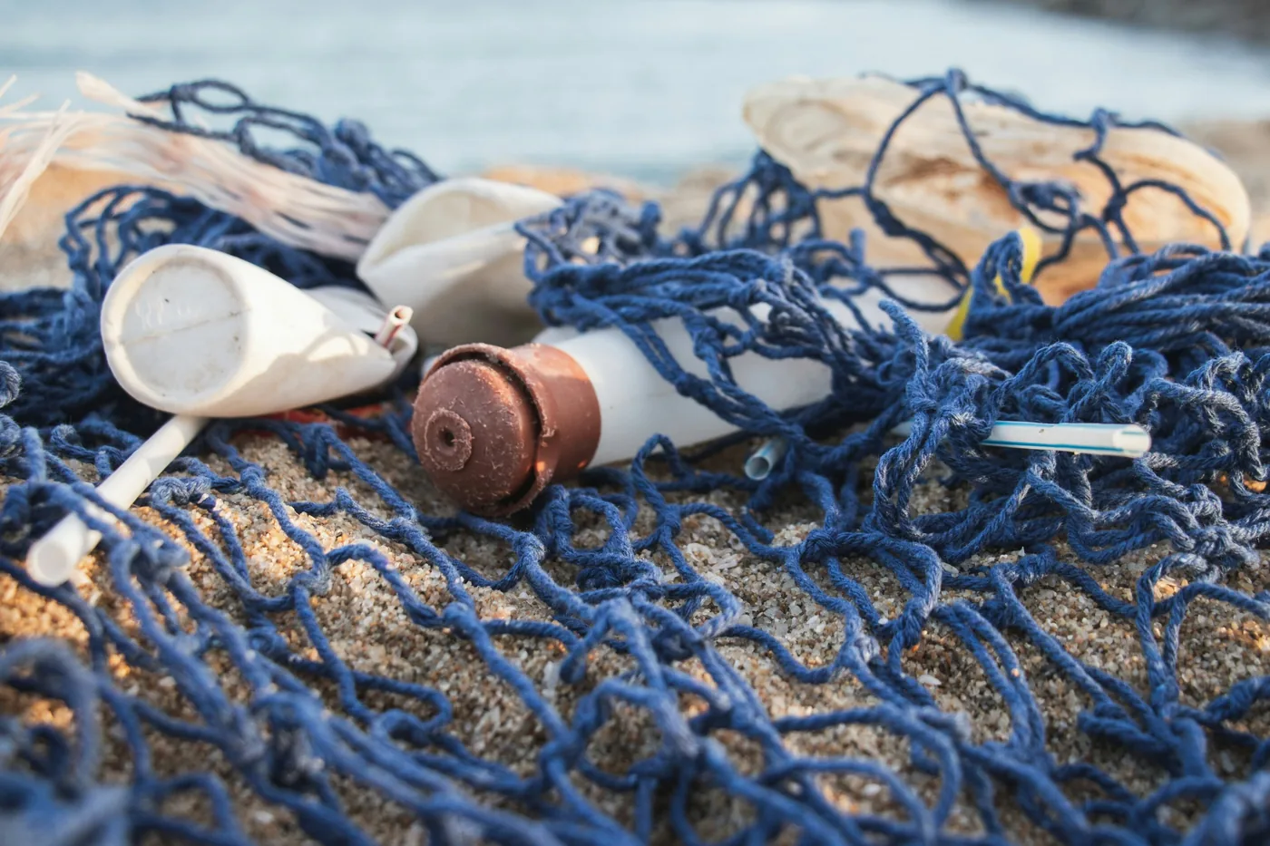 Plastic waste and marine debris accumulated on a beach in the Seychelles.