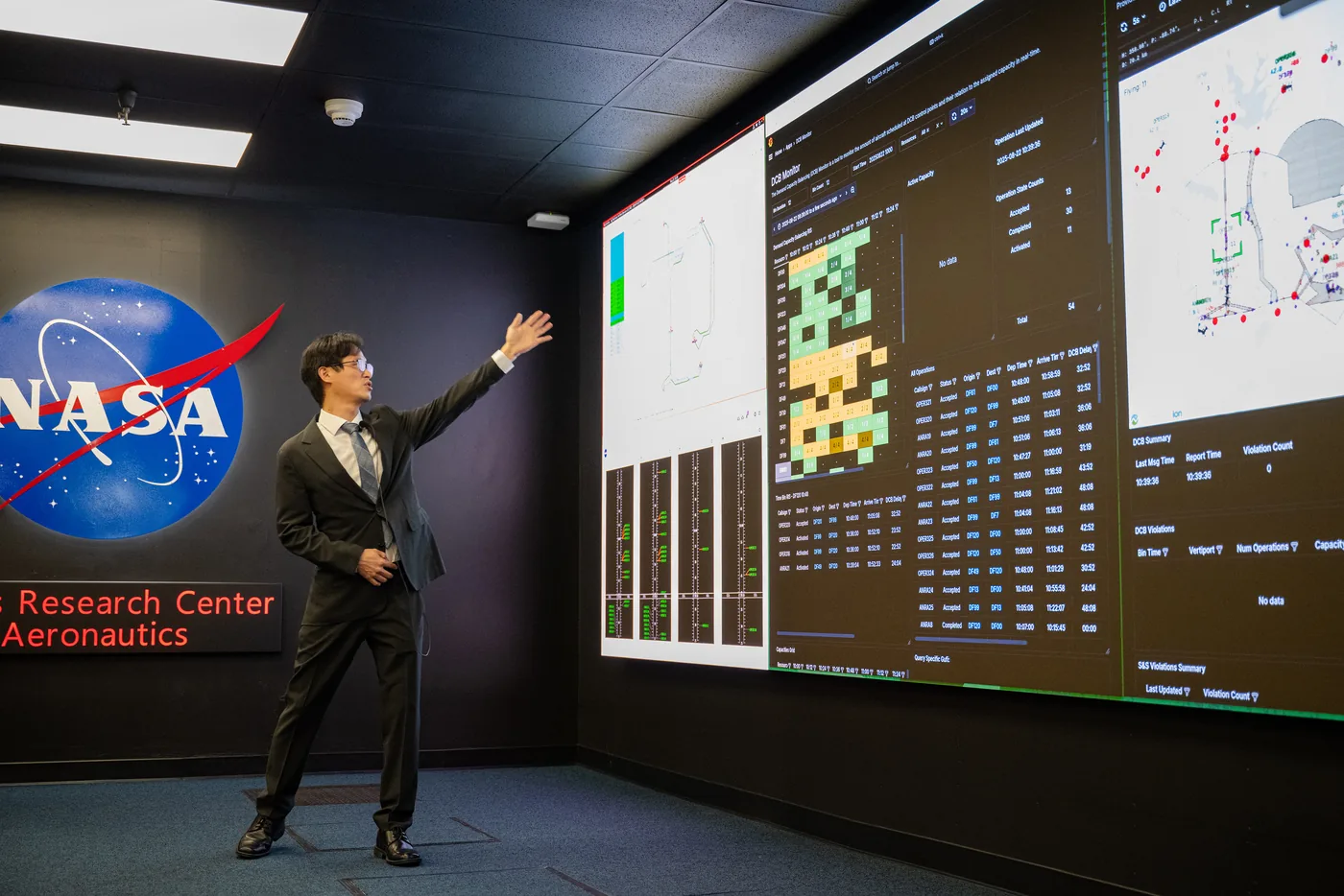 NASA engineer Hanbong Lee demonstrates urban air mobility traffic simulation capabilities at Ames Research Center.