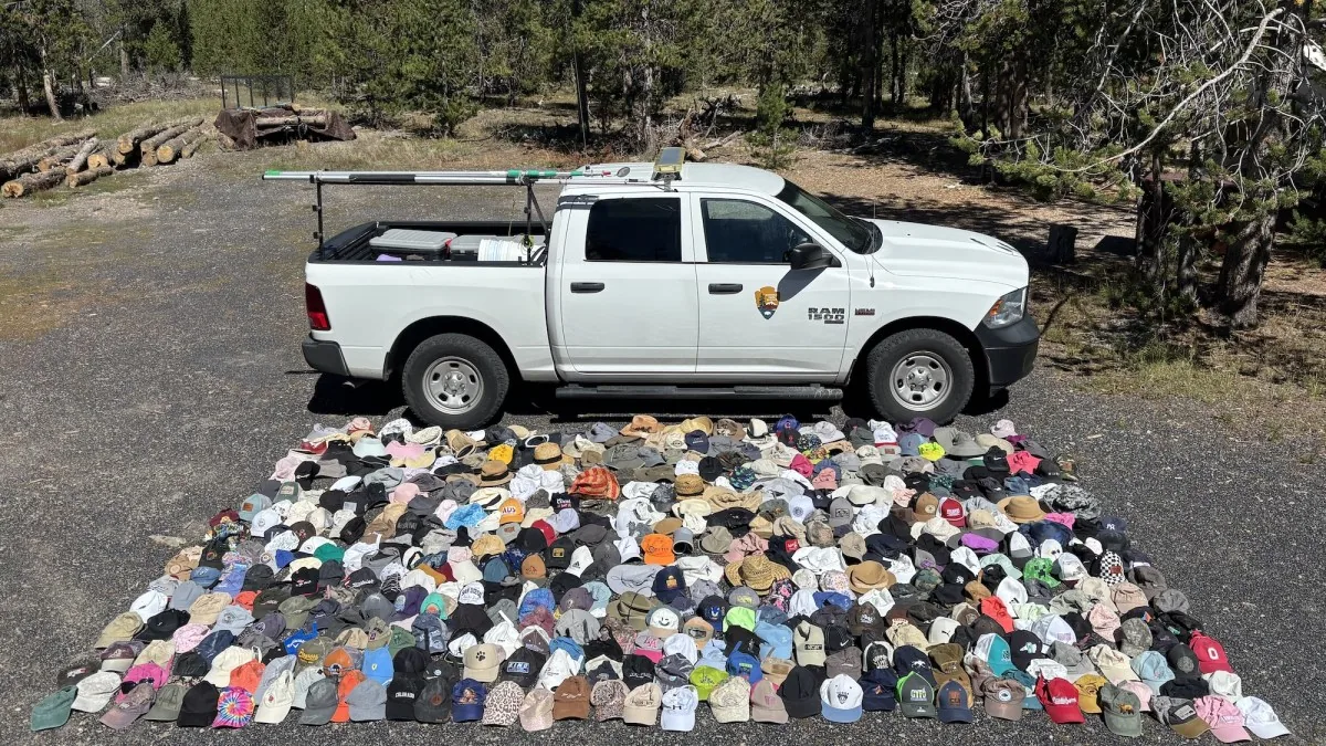 Yellowstone National Park staff display hundreds of hats recovered from Yellowstone hydrothermal areas.