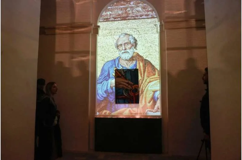 Projection of St. Peter during the AI-Enhanced Experience exhibition preview at the Vatican.