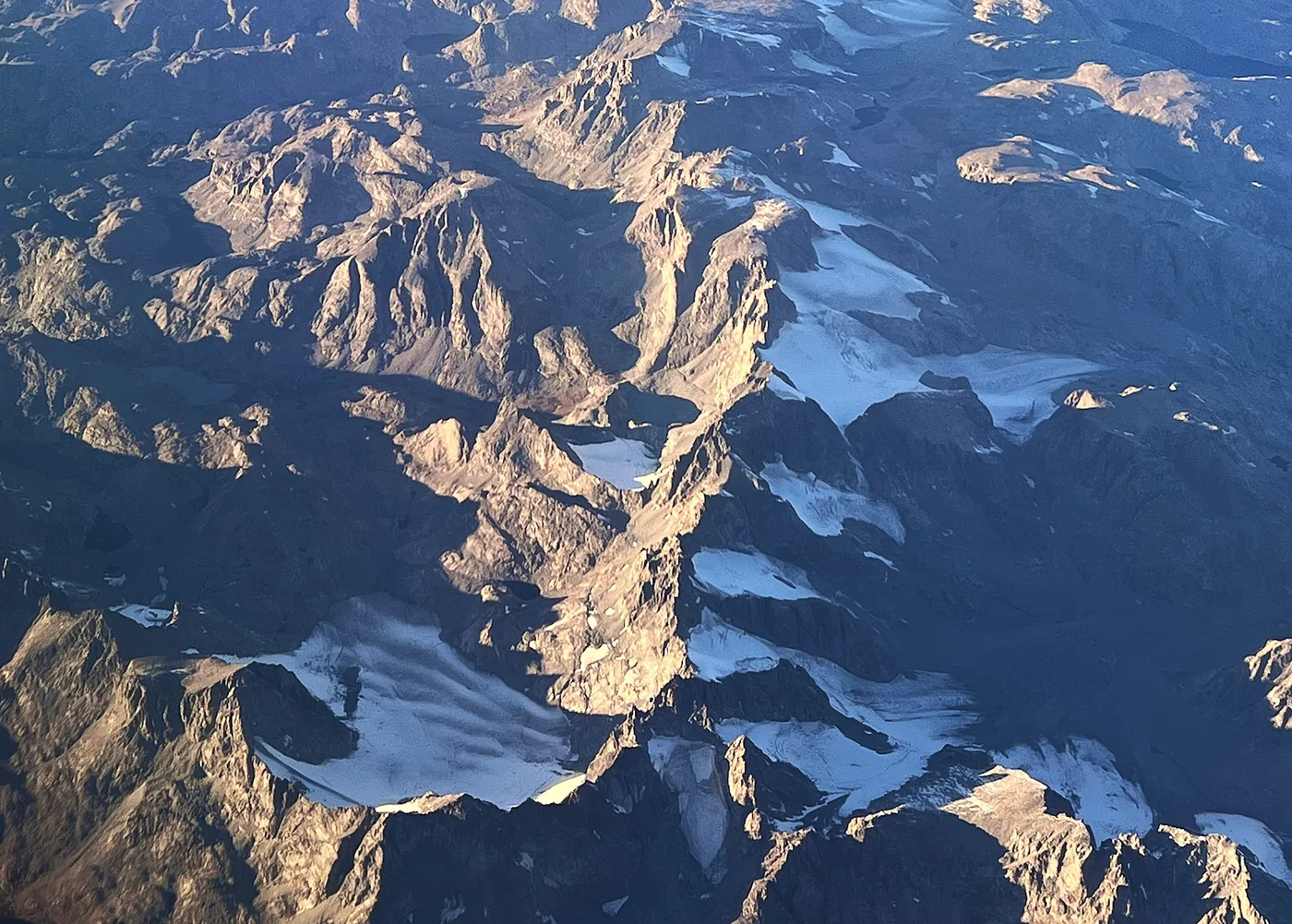 Mountain glaciers nestled in shaded niches of the Wind River Range in Wyoming.