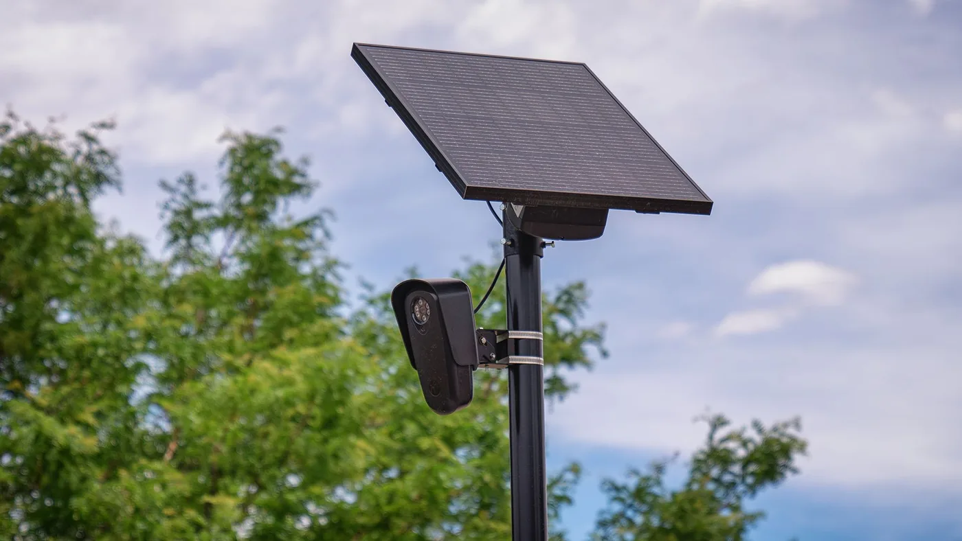 An automatic license plate reader mounted along a roadway to capture vehicle movements.