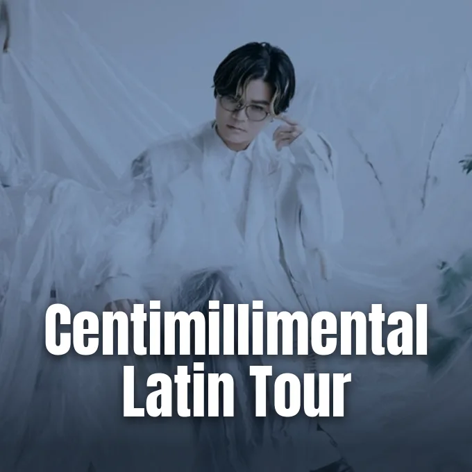 Musician Centimillimental posing in white attire and glasses against an ethereal, soft-lit background.