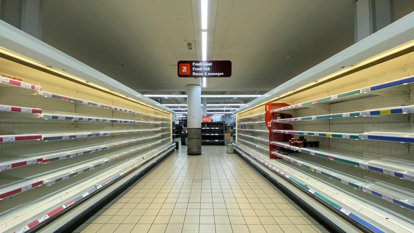 Empty supermarket refrigerators following the French supermarket cyberattack.