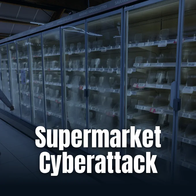 Empty refrigerated display cases in a supermarket with foggy glass doors and dark lighting