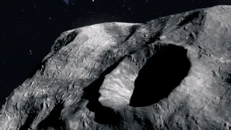 Artist concept of the Hera mission spacecraft scanning the impact crater on the asteroid Dimorphos.