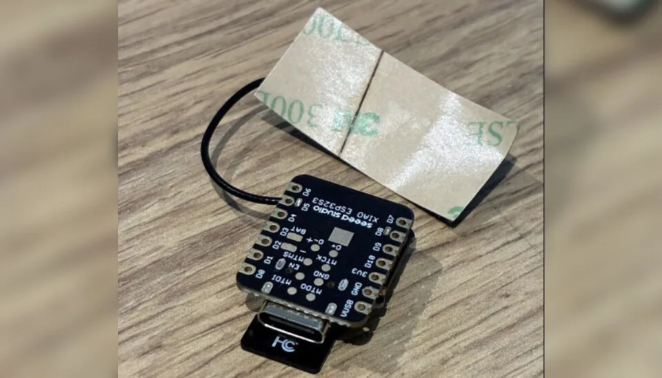 Second small black audio recording device recovered from an unattended bag.