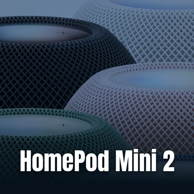 Multiple colorful Apple HomePod mini smart speakers displayed together in a clean studio product arrangement.