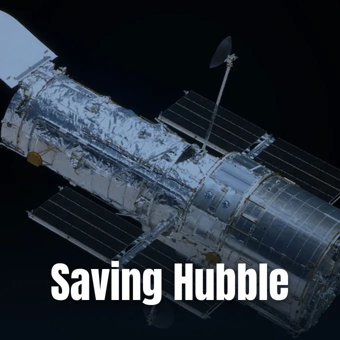 The Hubble Space Telescope in Earth orbit showing its silver foil insulation and solar arrays.