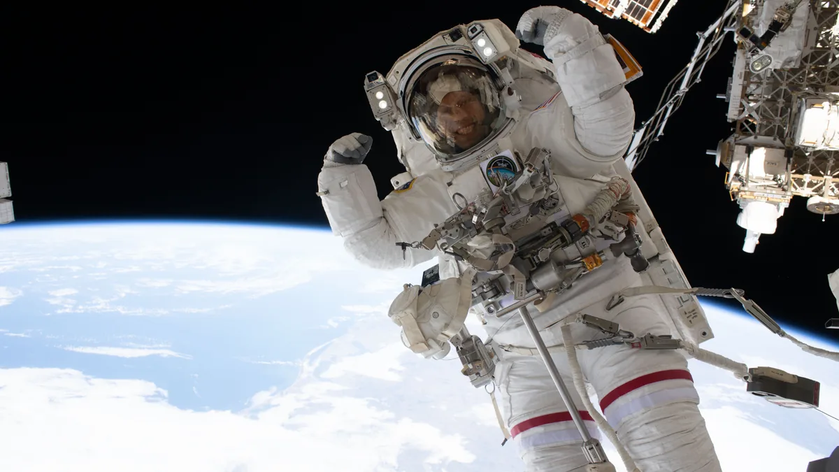 Astronaut outside the International Space Station during an ISS spacewalk