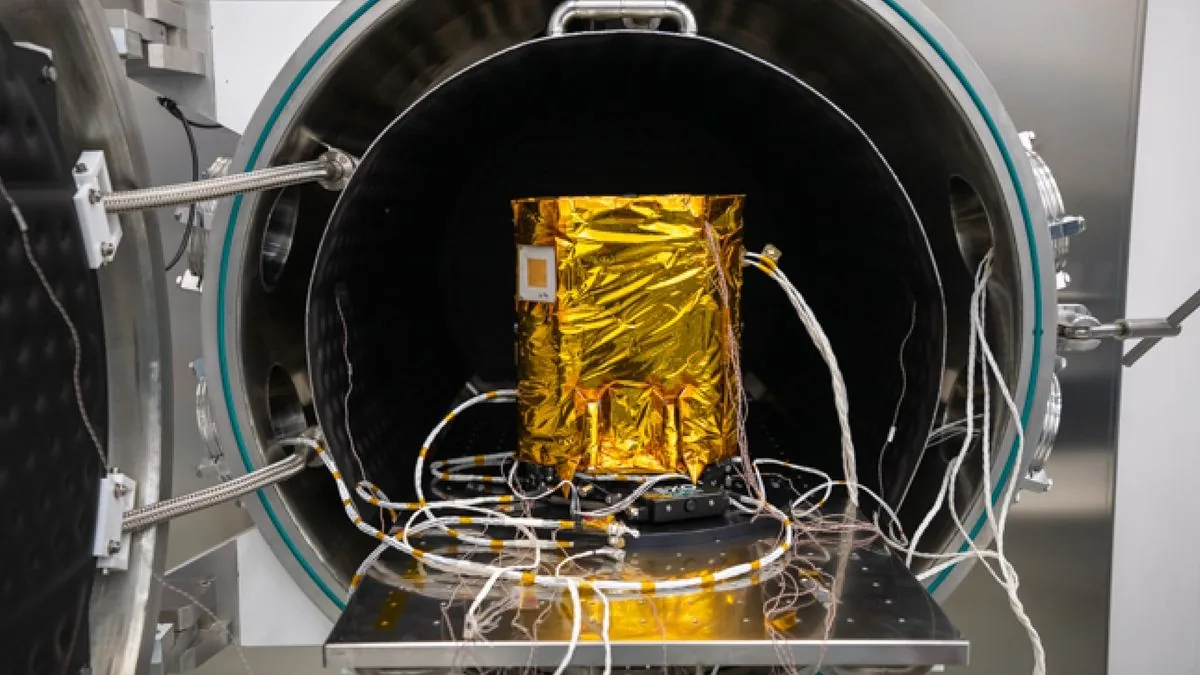 Close-up view of the golden rectangular lander probe for the Emirates Mission to the Asteroid Belt