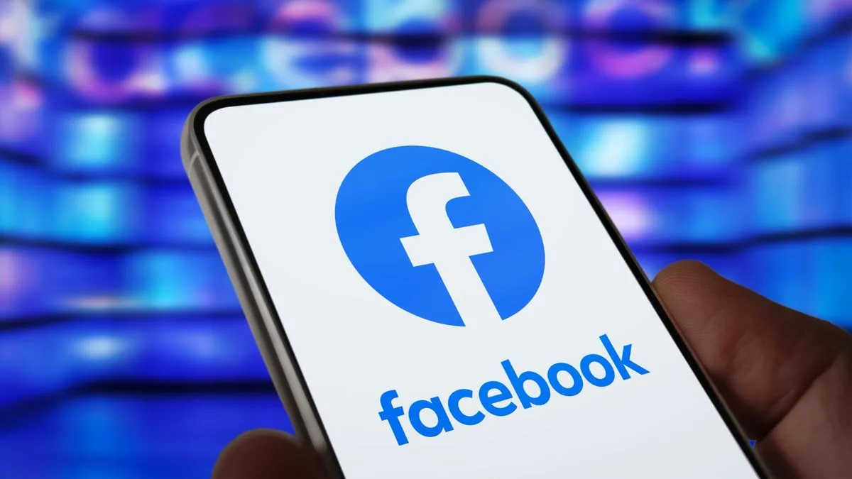 Facebook mobile application icon on smartphone screen