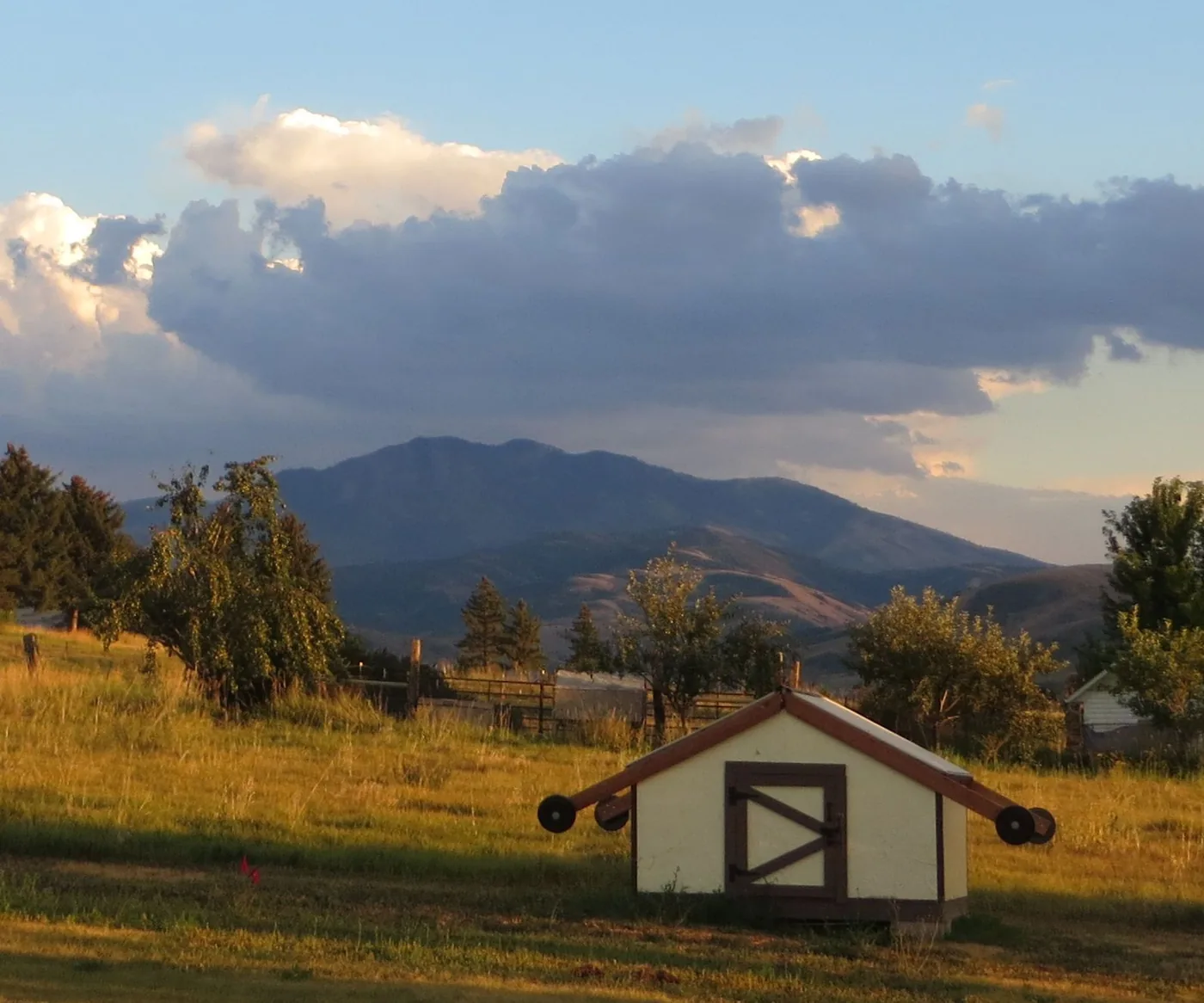 A compact wooden observatory with an opening roof built on an eight-foot footprint