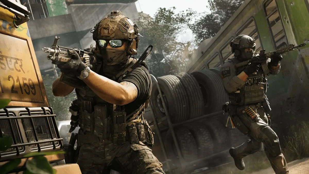 Two soldiers holding weapons in an open garage area.