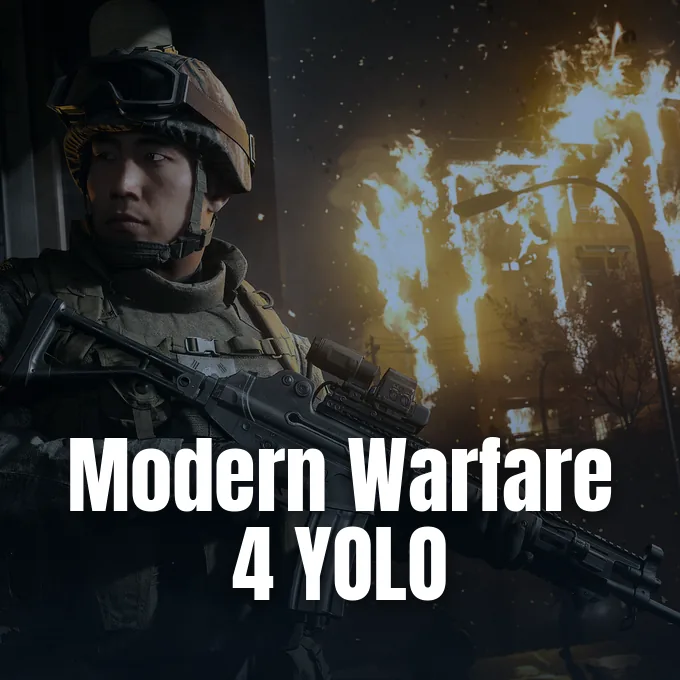 A soldier holding an assault rifle stands in front of a burning building at night.