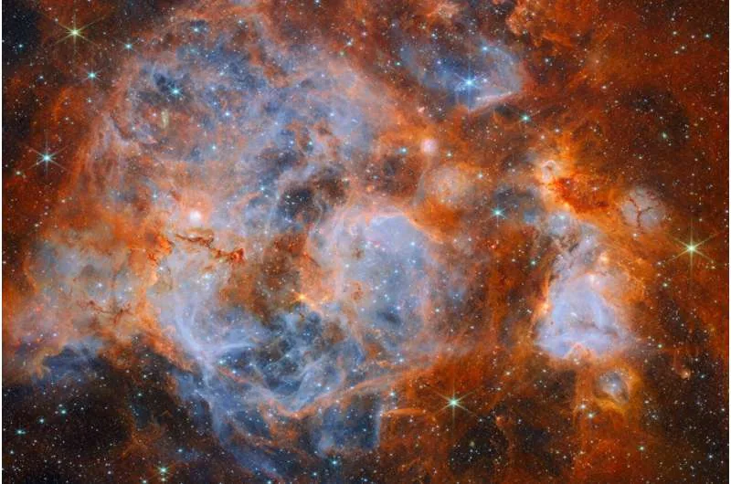Glowing clouds of ionized hydrogen and billowing dust in the N159 complex