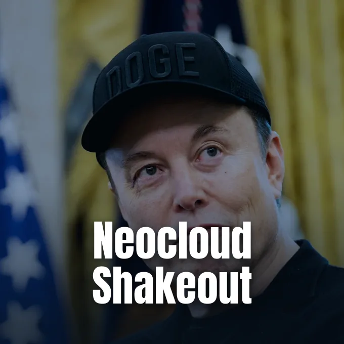 Elon Musk wearing a black cap during a public appearance in front of flags.
