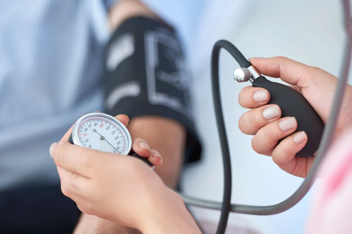 A clinical blood pressure cuff used to assess cardiovascular health in adult patients.