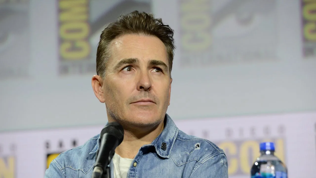 Actor Nolan North attending a public event in coverage discussing future game roles.