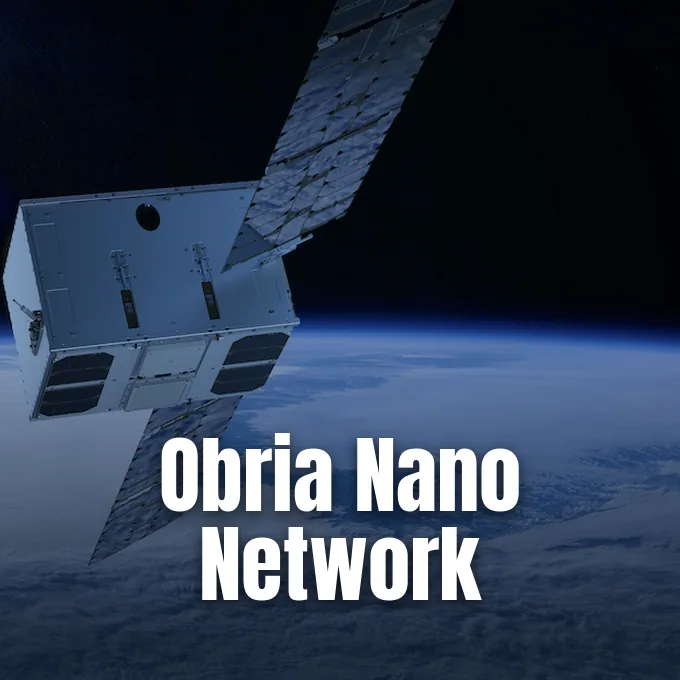 A small satellite with extended solar panels orbits above Earth's blue horizon in space.