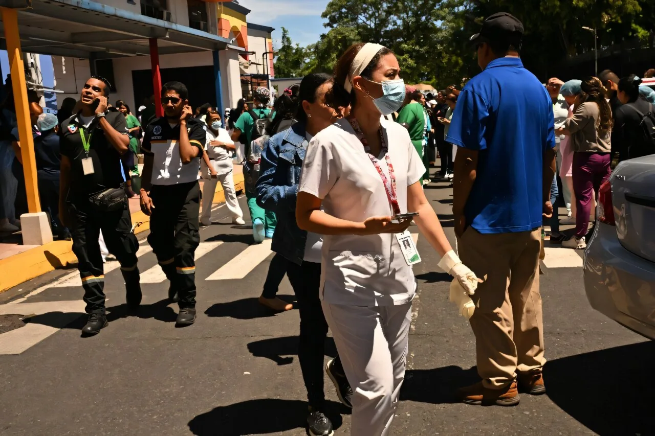 Residents evacuated from high-rise buildings in Panama City gathered on open streets.