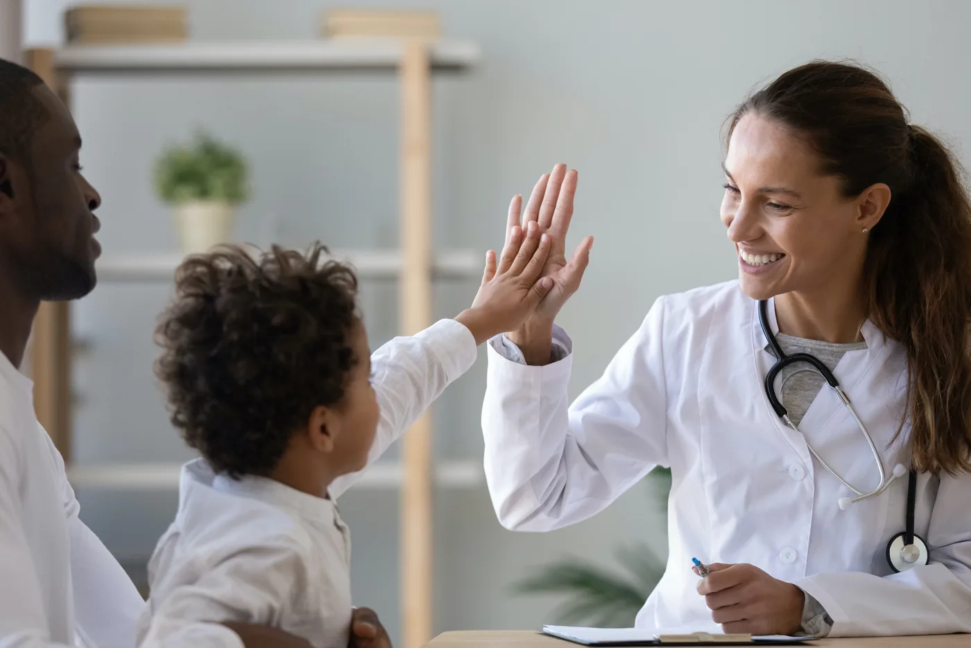 Clinical healthcare setting illustrating patient and physician interaction.