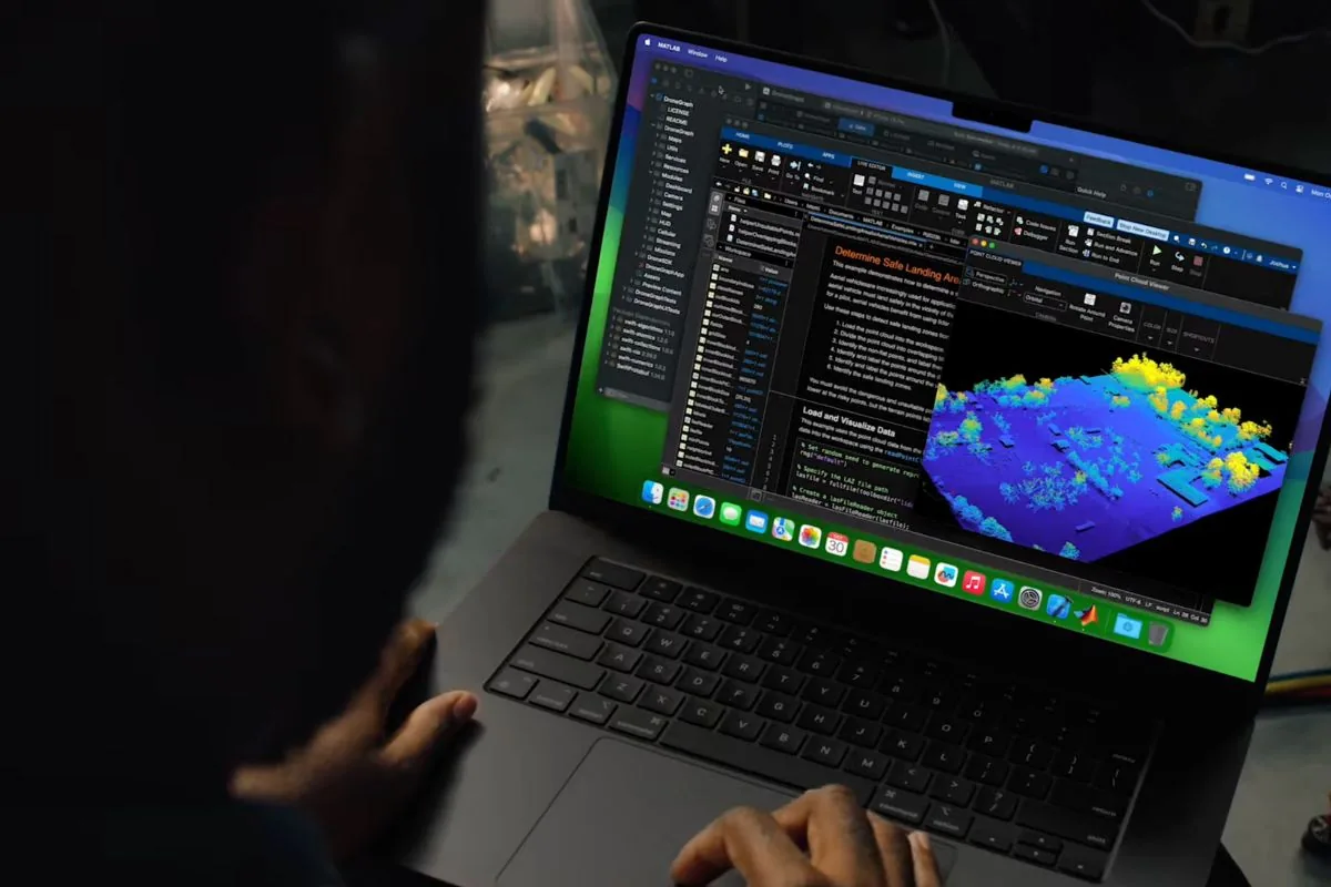 Apple MacBook Pro notebook open on a surface.