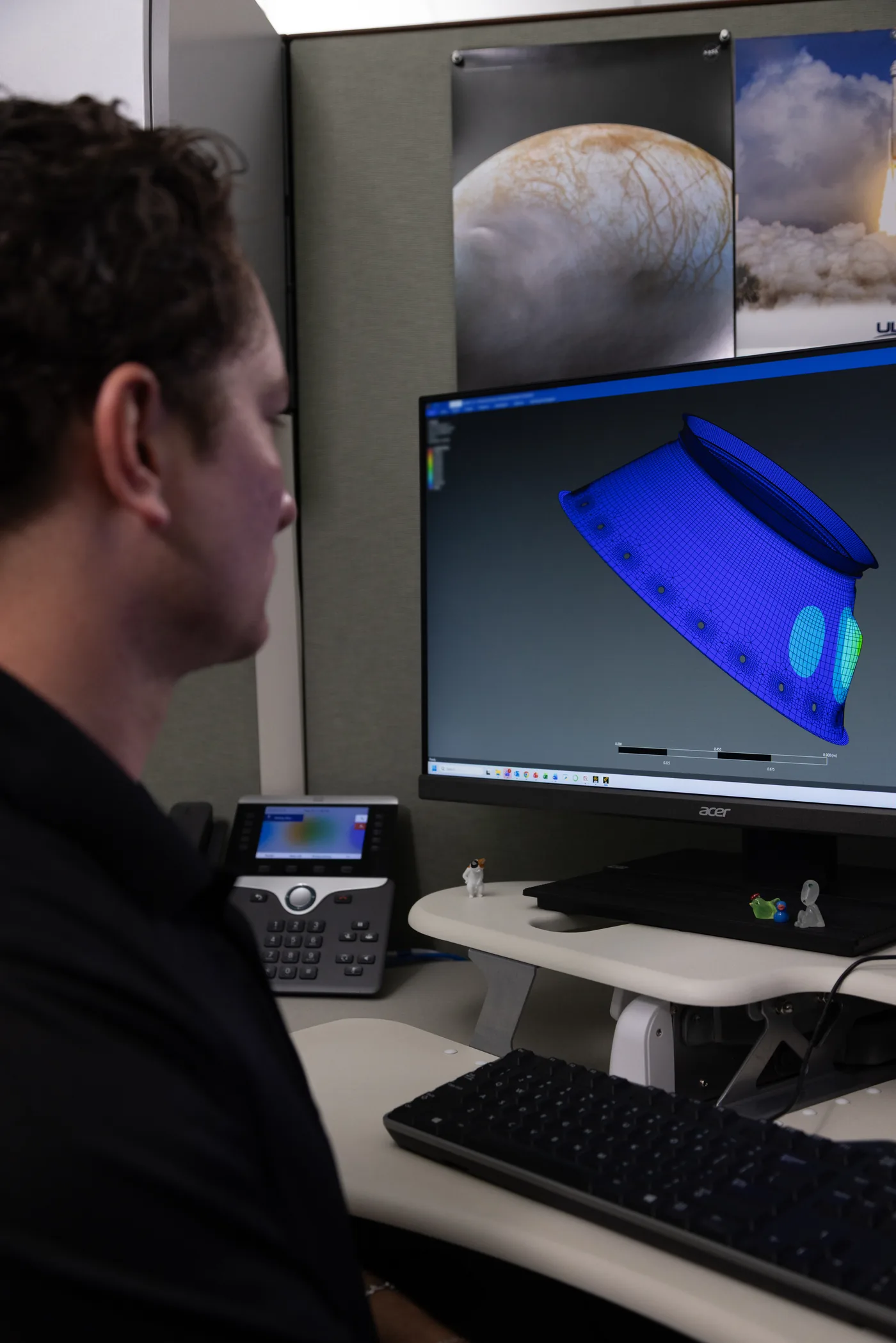 NASA engineers prepare structural components for dynamic testing at Kennedy Space Center.