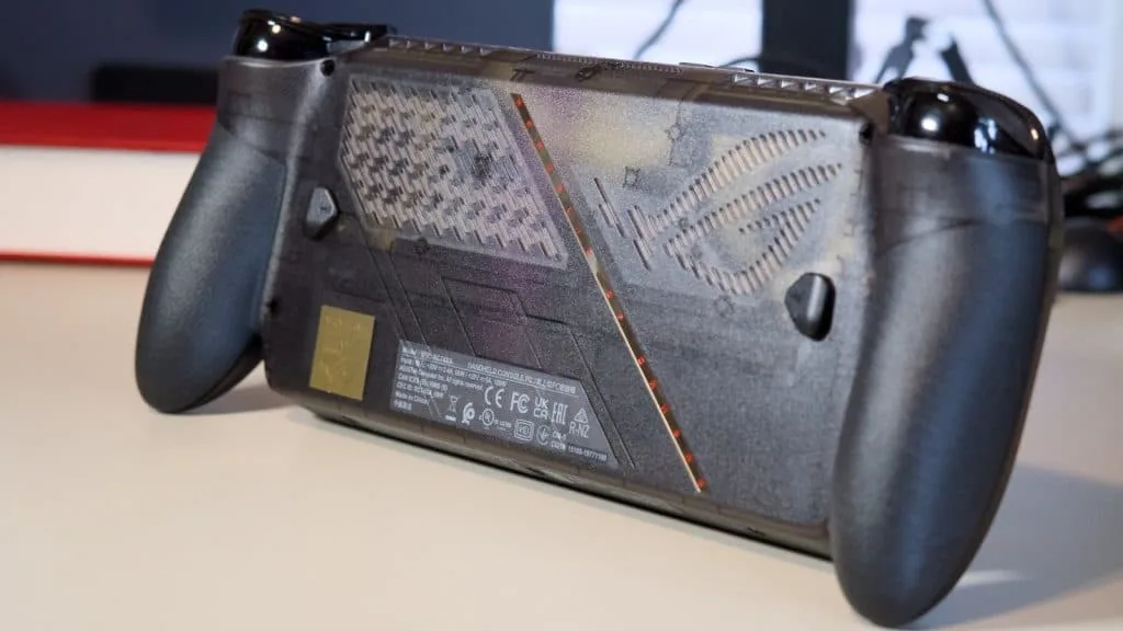 Rear panel of the handheld unit highlighting cooling vents and textured grips.