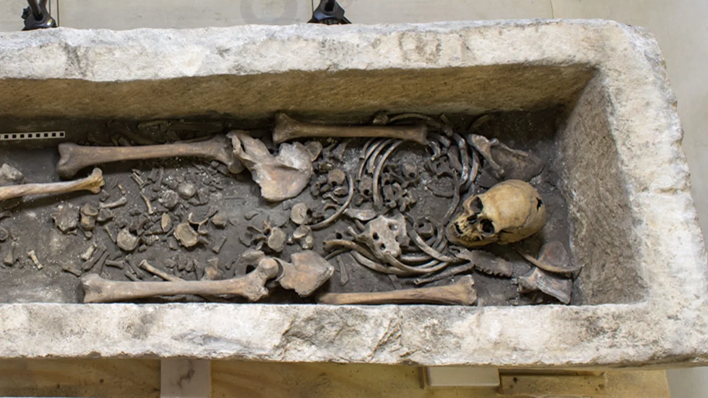 Archaeologists examine the Roman sarcophagus discovered at Westminster Abbey