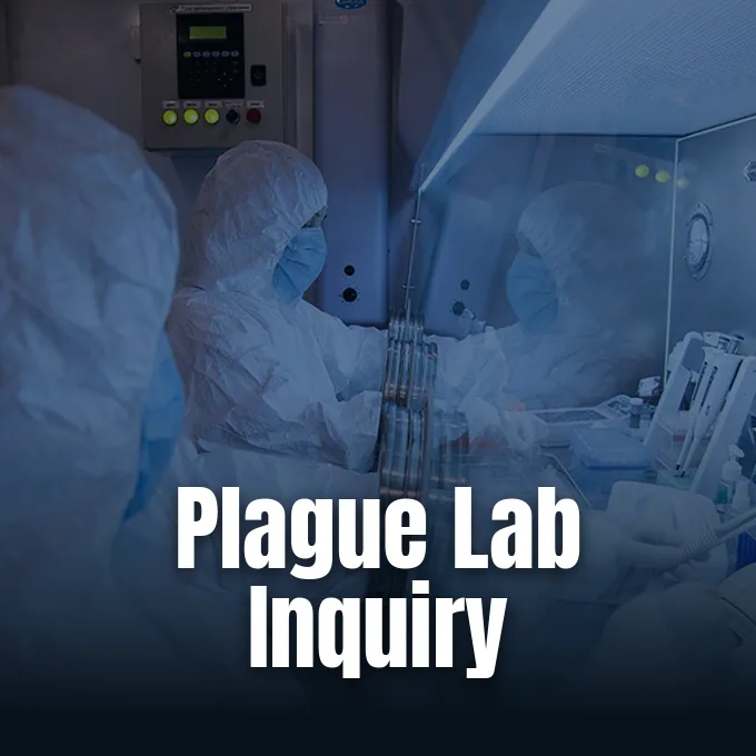 Scientists wearing protective hazmat suits work inside a high-containment biosafety laboratory.