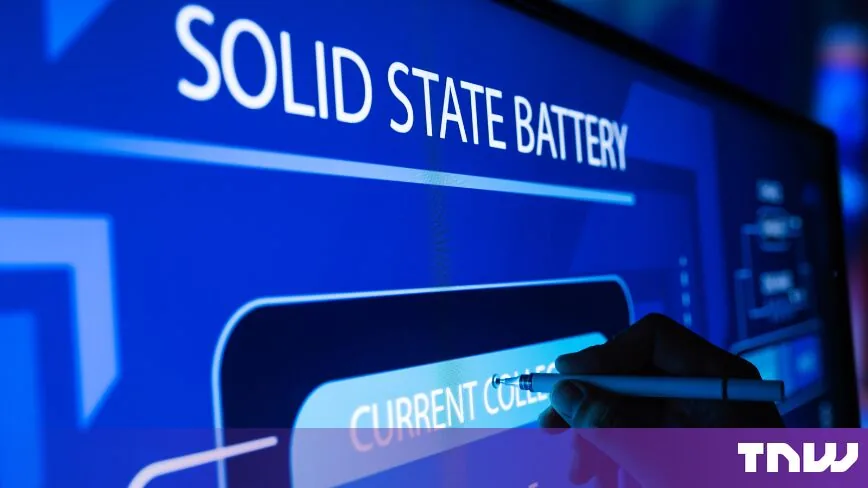 A presentation screen displays technical diagrams for solid-state batteries.