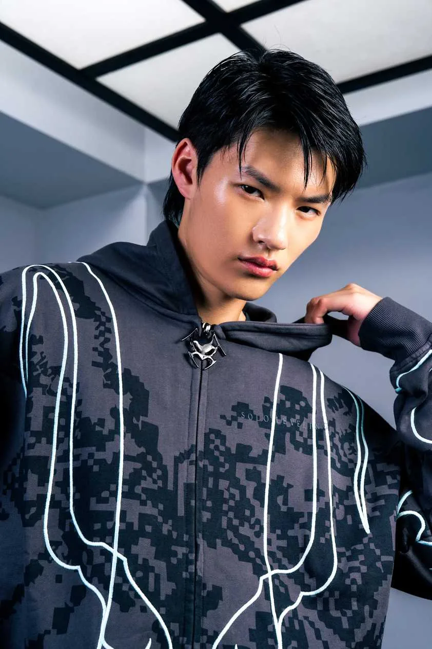 Solo Leveling clothing piece showing the Beru hoodie zipper styled after the Shadow General's face