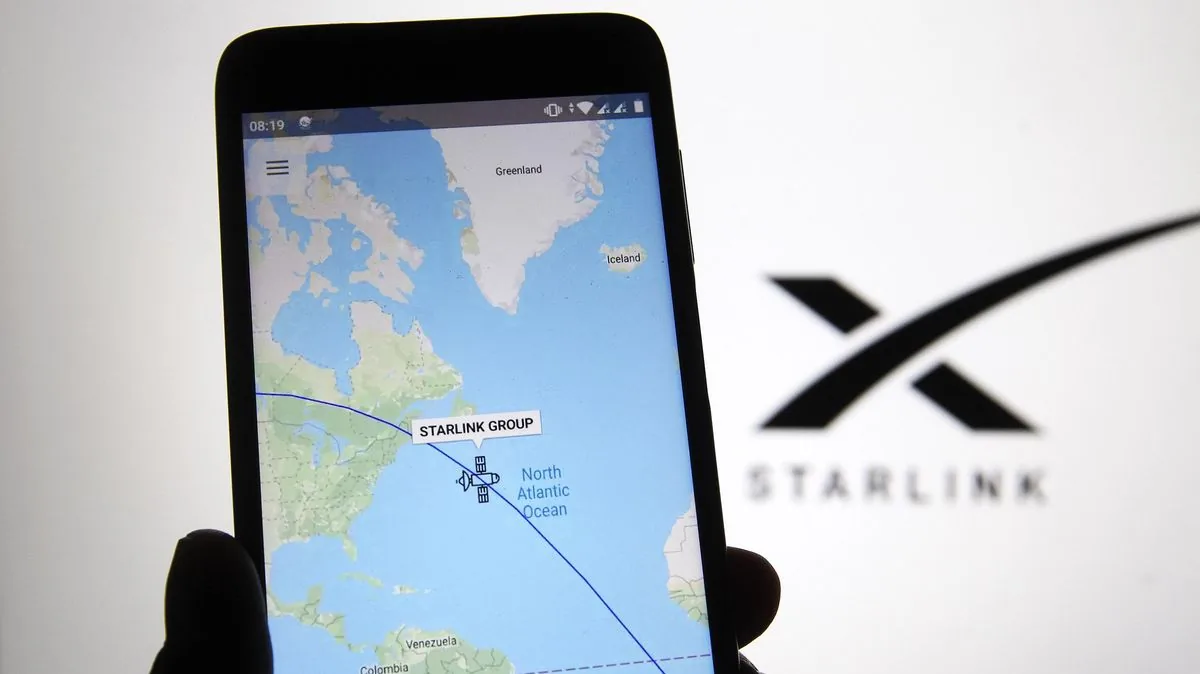 A smartphone displaying a Starlink application alongside the Starlink logo.