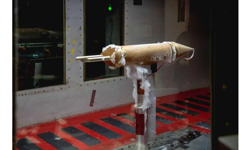 Ice collection on unheated sections of the ice drop detection probe in the tunnel test section.