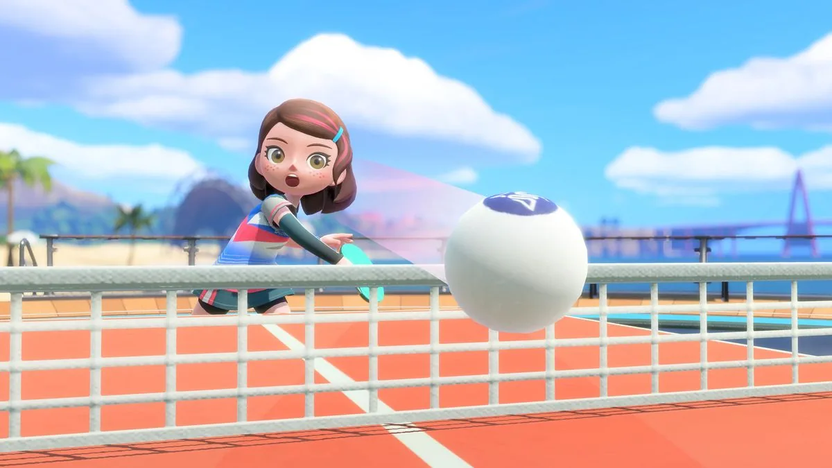 A player hits a ping pong ball with force in the table tennis event on Nintendo Switch 2.