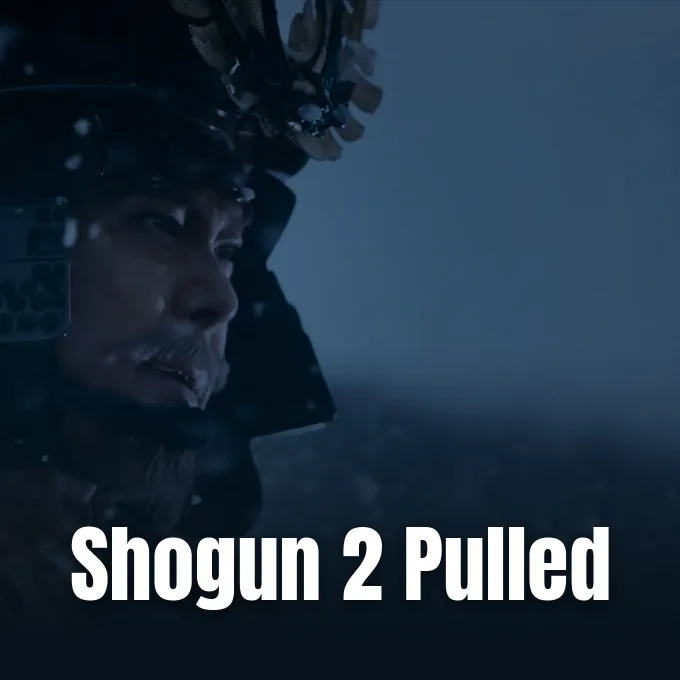A close-up shot of a samurai warrior wearing traditional armor and helmet in a cinematic scene.