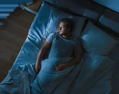Medical graphic illustrating insomnia and nighttime REM sleep disruption